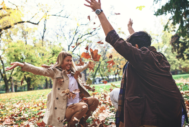 People outside enjoying Fall