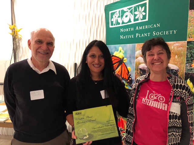 Picture of TDSB faculty member Ms. Wadia accepting the Garden Award on behalf of Agnes Macphail school community.