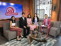 TDSB students sitting with CP24 TV host Gurdeep Ahluwalia.