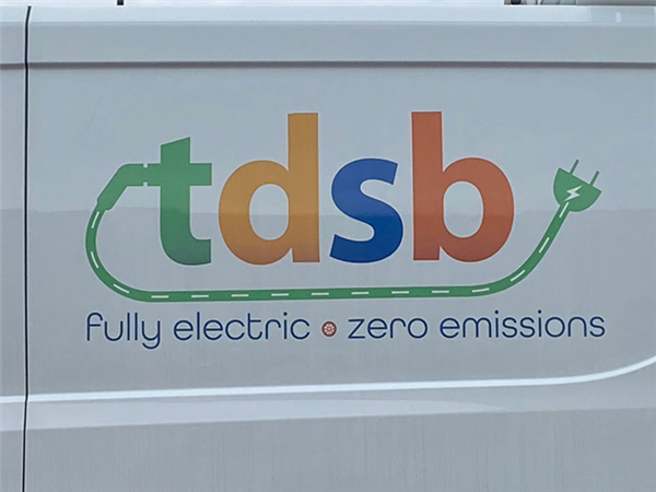 view of TDSB EV logo on van