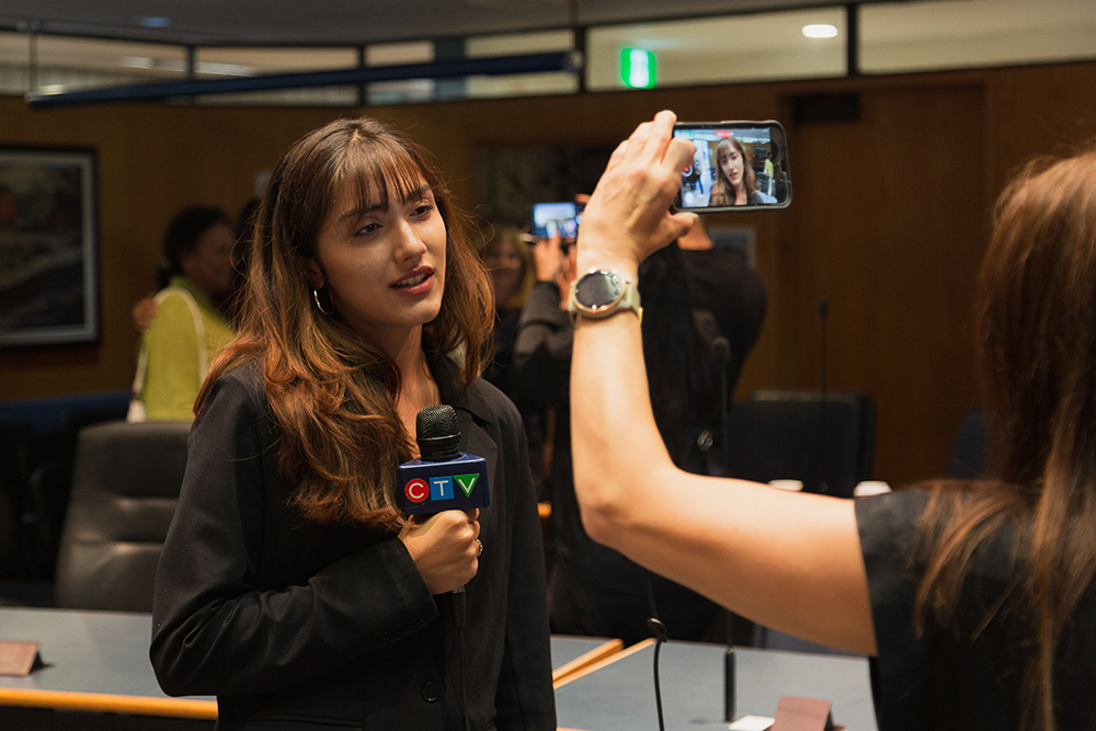 TDSB Top Scholar Elina Tabrizi being interviewed by media. Open Gallery