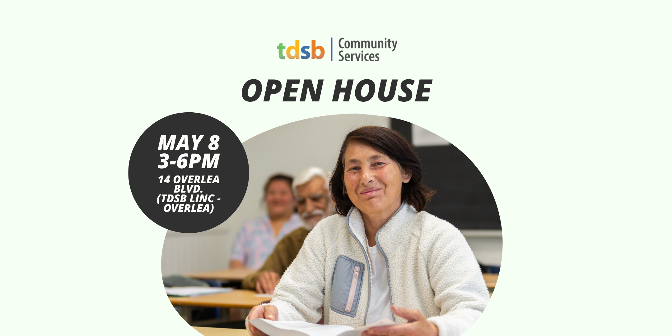 Female adult learner in a classroom in the forefront. behind her are a male Middle Eastern and female Asian adult learners. Words community house open services